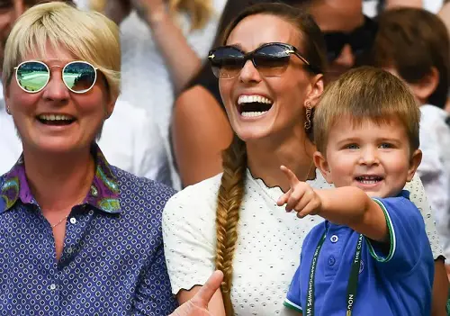 Novak Djokovic’s wife and son, Jelena and Stefan, look down upon Centre Court during Wimbledon in 2018
