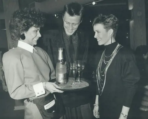 Borje Saliming and his first wife Margiita Salming in the 80s are served by a waitress wearing Margitta design
