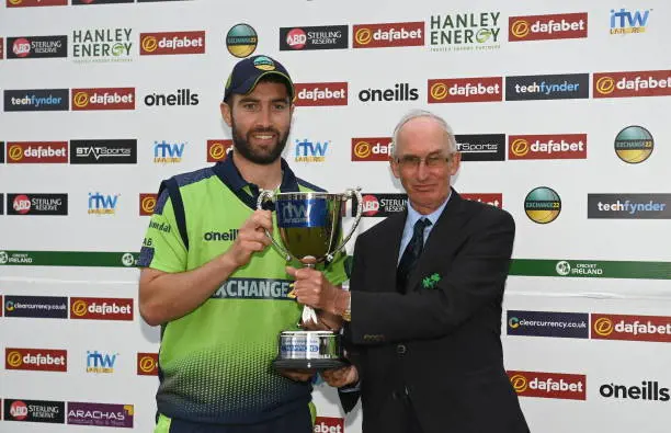  Ireland captain Andrew Balbirnie is presented the trophy by Cricket Ireland president David Griffin after the Men's T20 International match between Ireland and Afghanistan at Stormont in Belfast.