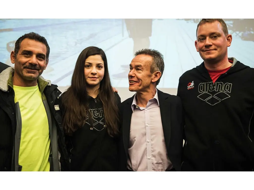 Yusra Mardini pictured with Sven Spannekrebs (4th from left), dad (1st from left), and Pere Miro (3ed from left)
