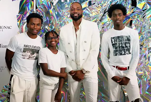 Dahveon Morris, Zion Wade, Dwyane Wade and Zaire Wade attend Dwyane Wade's 16 Year NBA Career Celebration Dinner on April 8, 2019 in Miami, Florida