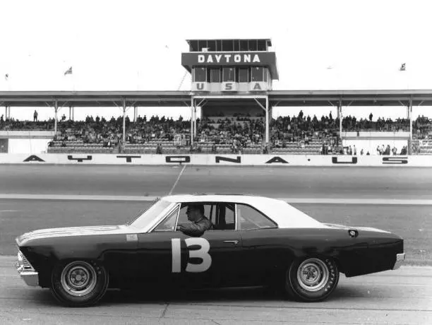  Curtis Turner #13 sits in his car before the Daytona 500 on February 26, 1967 at the Daytona International Speedway in Daytona Beach, Florida