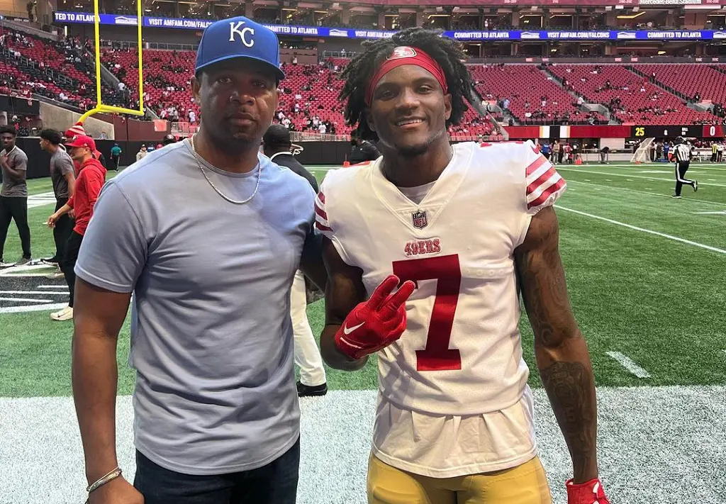 49ers cornerback Charvarius Ward at Mercedes-Benz Stadium snapping picture with his fan after the game.