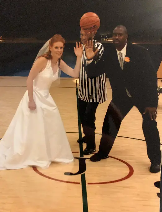 Tim Fudd and her wife Katie, married on basketball court