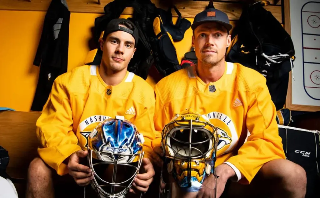 Juuse Saros with his idol Pekka Rinne. They too often hang out and do double dates. Rinne is dating her girlfriend Erika Parkko. They have a son.