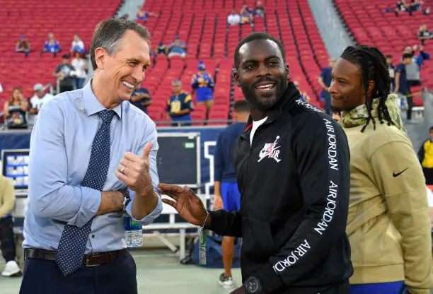 Michael Vick pictured with Todd Gurley ahead of the Los Angeles Rams and Cincinnati Bengals match in 2019
