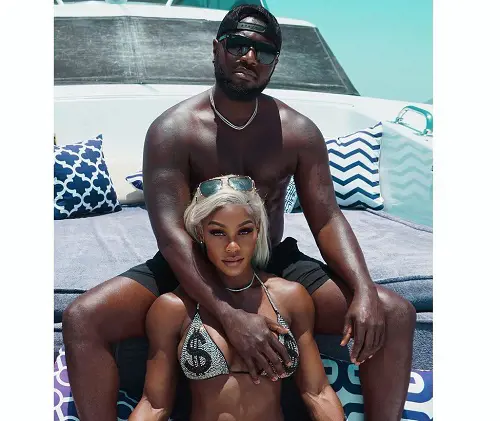 Jade Cargill and her partner Brandon Phillips pose together during their yacht trip to Cabo San Lucas, Mexico