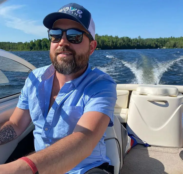 Jones enjoying boating at Gracefield, Quebec.