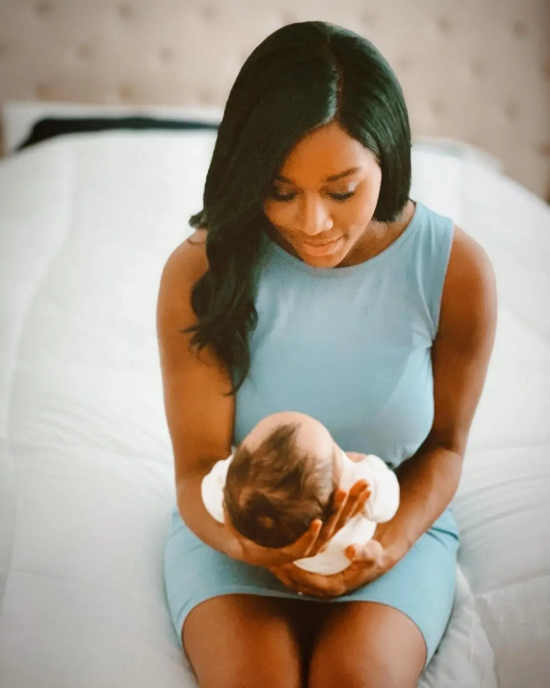 Sherree Burruss holding her daughter who was born in 2021.
