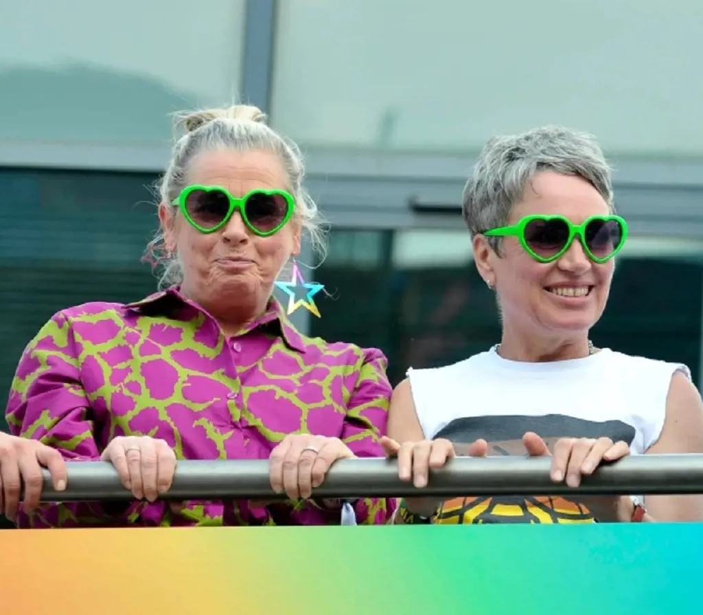 Jane Hazlegrove and Isobel Middleton on the Corrie bus at Manchester Pride.