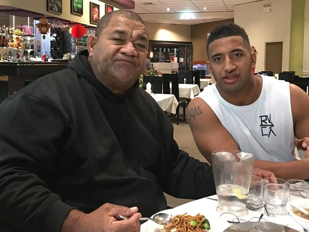 Viliame Kikau having a meal with his beloved father.