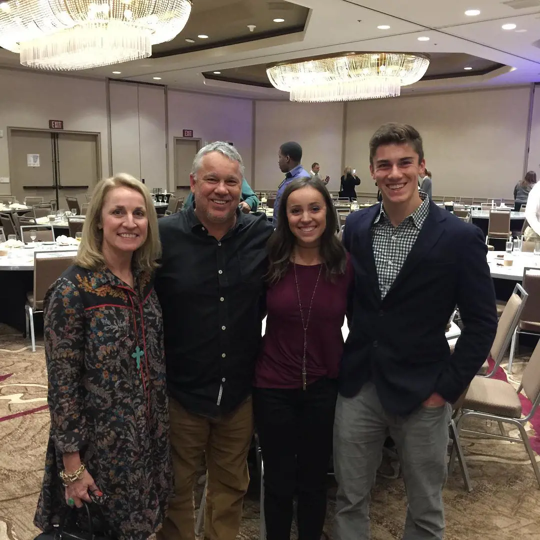 Riley posted a picture with his parents and sister at an event from 2017