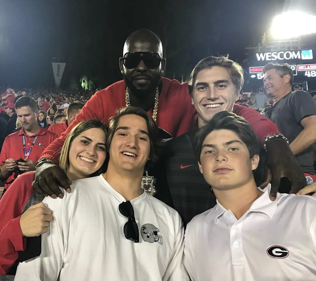 Chase and Ethan attending a game from the stand with their friend Mark Redman and sister Lexi in January 2018.