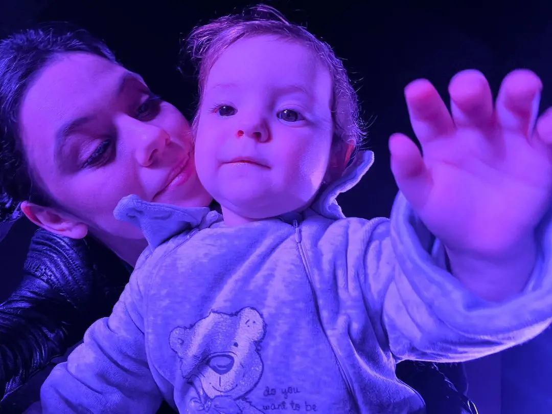 Elena with her younger son Dar at Crocus City Hall, Moscow in December 2022.