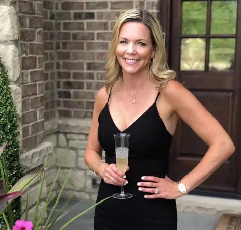 Dina looks stunning in her silhouette dress as Brian shares the picture of his partner on Mother's Day 
