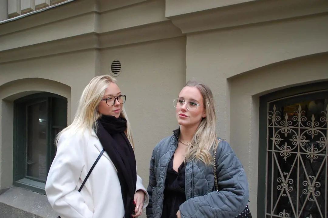Maja(right) with her friend models the glasses which they made for their group project 