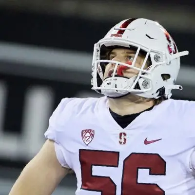 Jake Lynch pictured in the Stanford colors as he looks at the crowd after the game