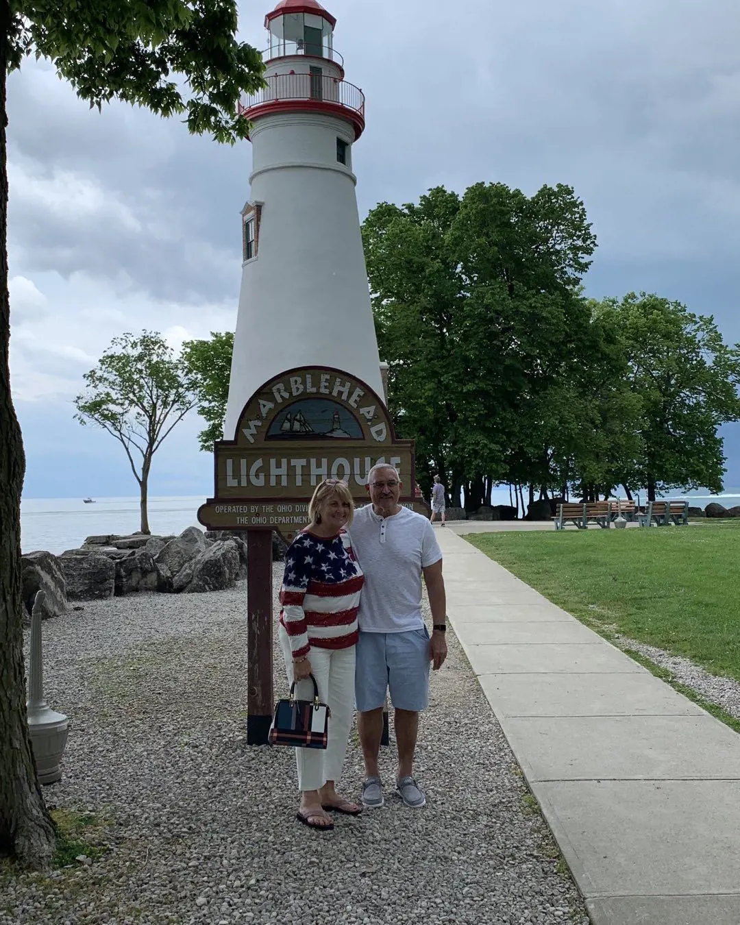 Sheldon puts his arm around his better half Sue as they are pictured at the Marblehead Lighthouse 