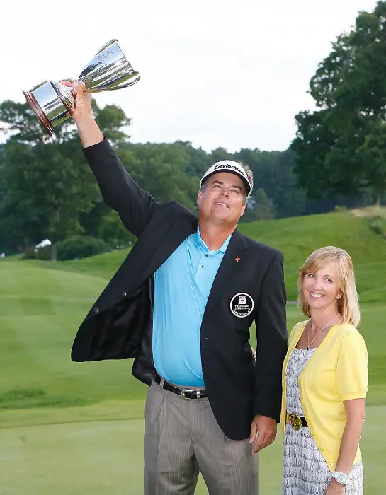 Sandy and Perry celebrated his win together the 2009 Travelers Championship 