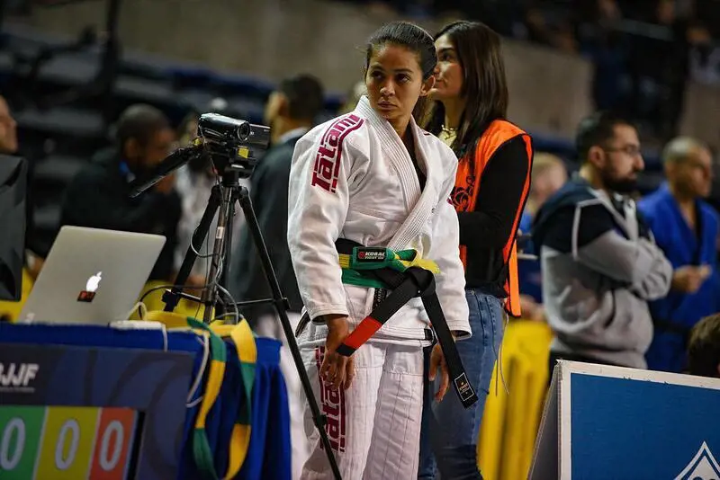 Bruna Burns pictured in a jiu-jitsu competition in 2019 as she looks at the crowd before facing her opponent